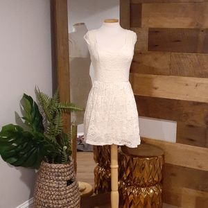 Cream colored cotton dress with lace detail